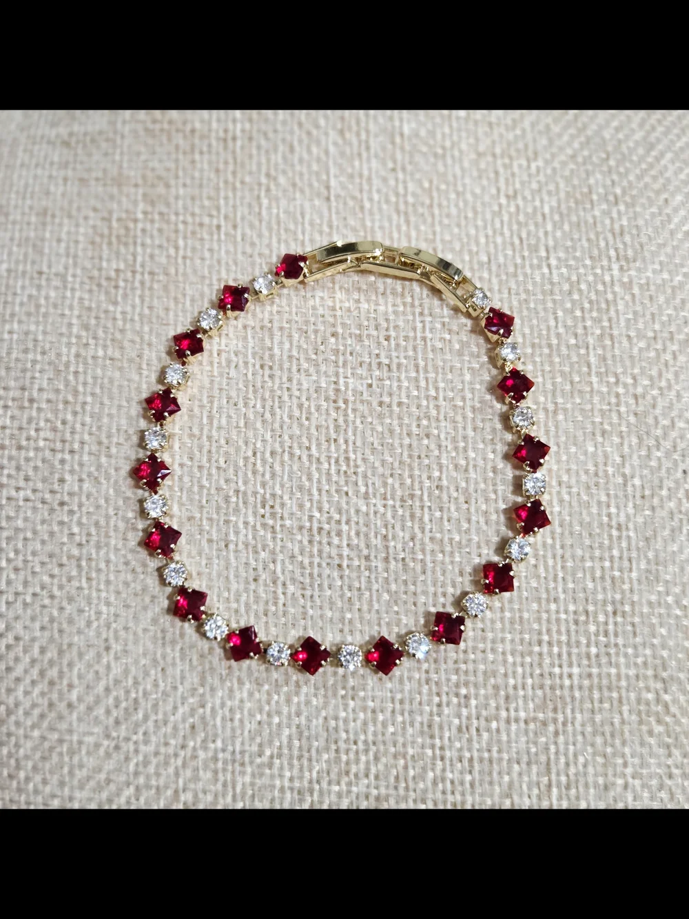 Gold-filled Bracelet with Red Gemstones and Clear Accents